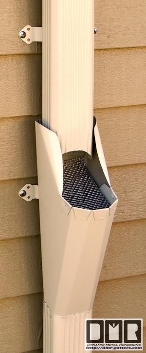 Here is a close-up of a hidden hanger and screw, in an almond painted aluminum gutter 